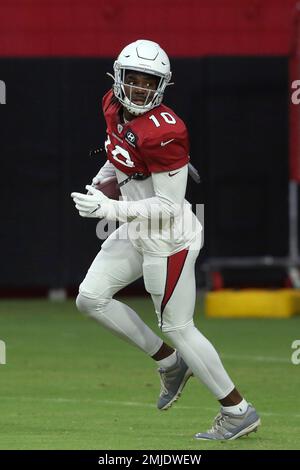 Arizona Cardinals running back Darrel Williams runs with the ball after  making a catch as he takes part in drills during the NFL football team's  training camp at State Farm Stadium, Tuesday