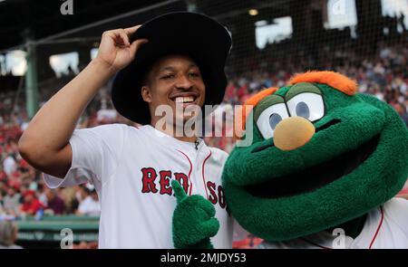 Wally the Green Monster, the Boston Red Sox's mascot, at Fenway Park,  Tuesday, Sept. 13, 2016, in Boston. (AP Photo/Charles Krupa Stock Photo -  Alamy