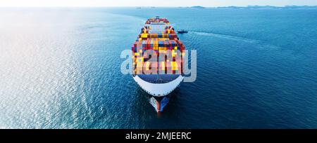 Front of cargo ship carrying container and running for export goods from cargo yard port to custom ocean concept technology transportation , customs c Stock Photo