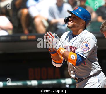 New York Mets' Robinson Cano celebrates his home run off Chicago
