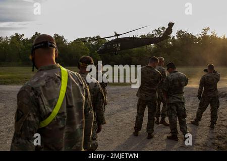 Company command teams across the Nebraska Army National Guard attend Operation Heartland Fury at the Camp Ashland and Mead Training Sites, Nebraska, Aug. 27, 2022. Operation Heartland Fury was an event hosted by Training Center Command, 209th Regional Training Institute, and consisted of various events and tours of training installations and equipment to show what capabilities are available to support all of Nebraska’s units. Some of the events included trench clearing with medical evacuation, leaders reaction course, the rappel tower and vehicle recovery. Stock Photo