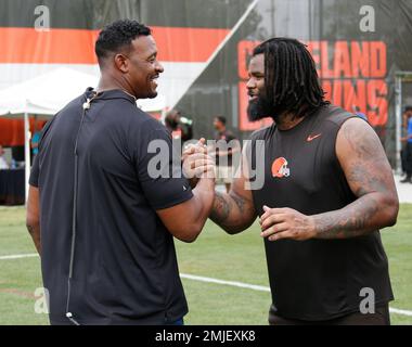 Former NFL player Willie McGinest talks about the Cleveland Browns on NFL  Network during practice at the NFL football team's training facility  Wednesday, July 31, 2019, in Berea, Ohio. (AP Photo/Ron Schwane