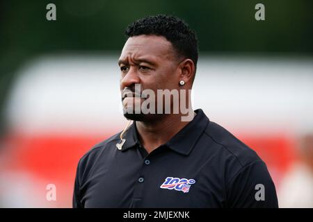 Former NFL player Willie McGinest talks about the Cleveland Browns on NFL  Network during practice at the NFL football team's training facility  Wednesday, July 31, 2019, in Berea, Ohio. (AP Photo/Ron Schwane