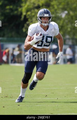 Tennessee Titans tight end Cole Wick runs a drill during NFL