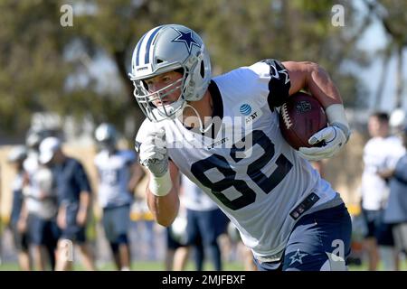 FILE – In this Oct. 10, 2019, file photo, Dallas Cowboys' Jason Witten (82)  warms up before an …