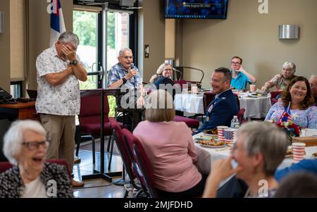 Clifford Good, World War II veteran, tells WWII stories to his friends and family during his 100th  birthday celebratory luncheon at the First Baptist Church in O’Fallon, Illinois, Aug. 28, 2022. Good flew nearly 50 combat missions: 33 missions over Italy, 2 missions over southern France, 5 missions over Greece, 4 missions over Germany, 2 missions over Bulgaria and 1 mission over Yugoslavia. Stock Photo