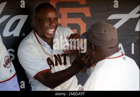 San Francisco Giants' Kevin Mitchell throws his helmet in frustration after  striking out in the sixth inning of the opening game of the World Series,  Saturday, Oct. 14, 1989 in Oakland against