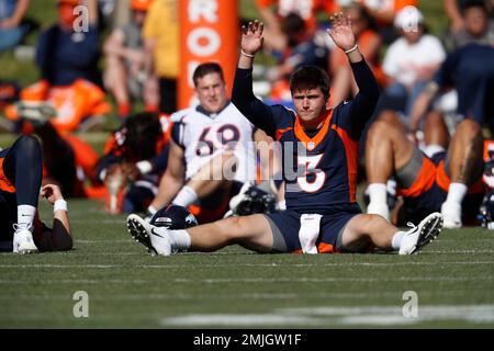 Denver Broncos quarterback Drew Lock scrambles against the New England  Patriots in the second half of an NFL football game, Sunday, Oct. 18, 2020,  in Foxborough, Mass. (AP Photo/Steven Senne Stock Photo 