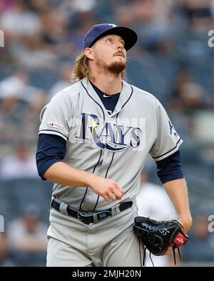 Tampa Bay Rays relief pitcher Ryne Stanek watches a solo home run