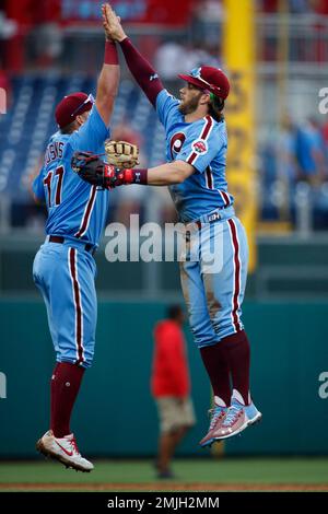 St. Petersburg, United States. 06th Apr, 2022. St. Petersburg, FL USA:  Philadelphia Phillies designated hitter Bryce Harper (3) is fist bumped by  first baseman Rhys Hoskins (17) after homering in the first