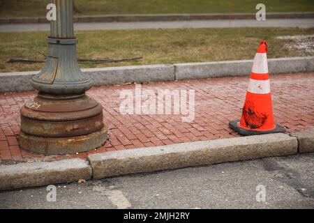 construction cones middle of street roadblock danger orange Stock Photo