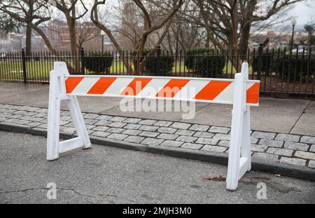 construction cones middle of street roadblock danger orange Stock Photo