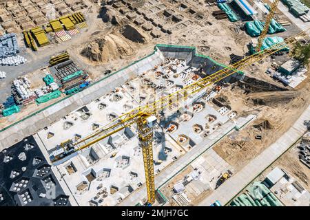 construction site. concrete foundation and construction equipment. aerial view. Stock Photo