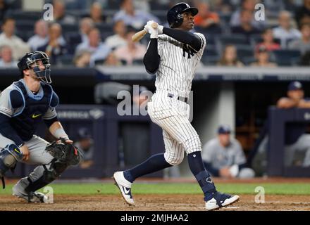 New York Yankees' Didi Gregorius watches his grand slam during the eighth  inning of the team's baseball game against the Tampa Bay Rays, Tuesday,  July 16, 2019, in New York. Rays catcher
