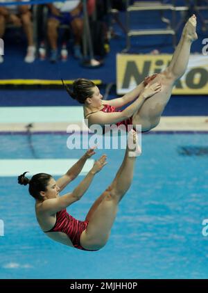 Madeline Coquoz and Jessica-Floriane Favre of Switzerland compete ...