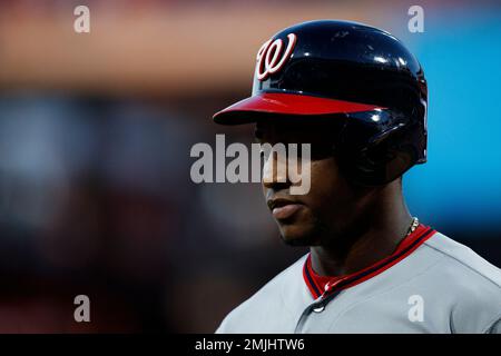 Washington Nationals' Victor Robles walks in the dugout after