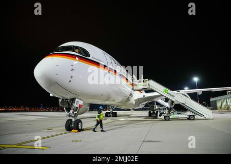 28 January 2023, Brandenburg, Schönefeld: The new Airbus A350 'Konrad Adenauer' of the Berlin Air Force stands ready at the military section of Berlin-Brandenburg Airport (BER) for the Chancellor's trip to Latin America with the first stop in Argentina. After Argentina, Scholz will visit Chile and Brazil. The aim of the trip is to strengthen cooperation with Latin America in competition with Russia and China. One of the topics will be a free trade agreement between the EU and the Mercosur countries Argentina, Brazil, Paraguay and Uruguay, which is currently being negotiated. Photo: Kay Nietfel Stock Photo