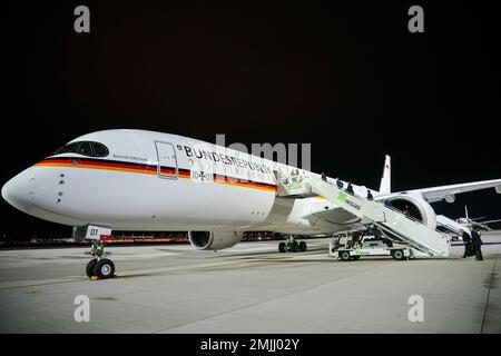 28 January 2023, Brandenburg, Schönefeld: The new Airbus A350 'Konrad Adenauer' of the Berlin Air Force stands ready at the military section of Berlin-Brandenburg Airport (BER) for the Chancellor's trip to Latin America with the first stop in Argentina. After Argentina, Scholz will visit Chile and Brazil. The aim of the trip is to strengthen cooperation with Latin America in competition with Russia and China. One of the topics will be a free trade agreement between the EU and the Mercosur countries Argentina, Brazil, Paraguay and Uruguay, which is currently being negotiated. Photo: Kay Nietfel Stock Photo