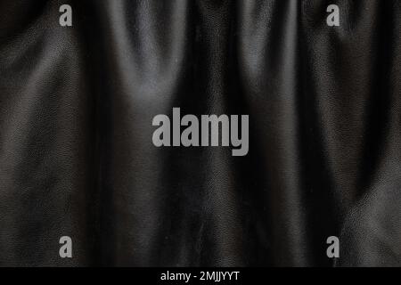 background of black pleated faux fabric Stock Photo
