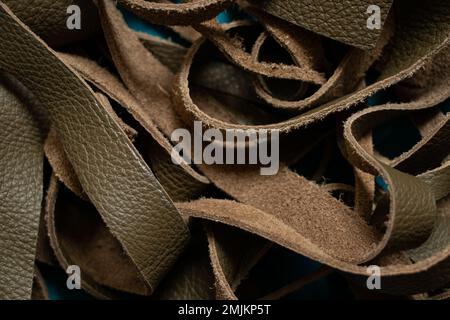 pieces of green leather stripes as a background close up Stock Photo