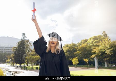 Back, education and black woman with graduation, celebration and success  with a diploma. Female person, graduate and girl with a degree, achievement  Stock Photo - Alamy