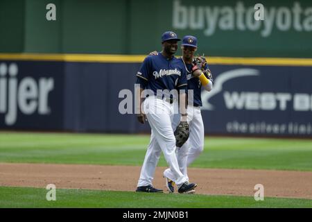 Milwaukee Brewers' Orlando Arcia smiles from the dugout at Miller Park  before a home opener baseball game between the Milwaukee Brewers and St.  Louis Cardinals Monday, April 2, 2018, in Milwaukee. (AP