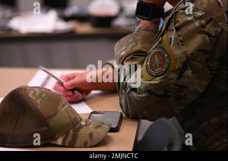 A student attends the Joint Tactical Combat Casualty Care-K-9 course at the Joint Base Elmendorf-Richardson hospital, Alaska, Sept. 1, 2022. Students of the course spent the morning in learning mode, then split into two groups in the afternoon during the hands-on portion of the course, which provided them with shock treatment and respiratory distress scenarios for training. IDMT,JBER,K9,Medical,Military working dogs,TCCC, Stock Photo