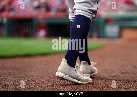 The Stance socks and New Balance cleats worn by New York Mets' Francisco  Lindor are seen as he stands on the dugout steps during a baseball game  against the Cincinnati Reds in