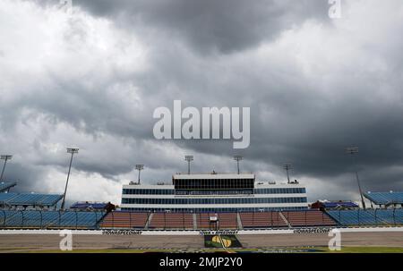 Storms clouds move in over the track before a NASCAR Truck Series auto race, Saturday, June 15, 2019, at Iowa Speedway in Newton, Iowa. (AP Photo/Charlie Neibergall)