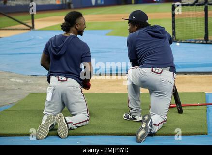 Atlanta Braves' Ozzie Albies talks to Philadelphia Phillies' Jean Segura  during patting practice before Game 3 of baseball's National League  Division Series, Friday, Oct. 14, 2022, in Philadelphia. (AP Photo/Matt  Slocum Stock