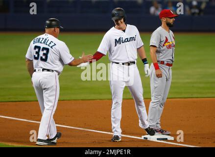 Miami Marlins left fielder Adam Duvall (14) rounds third base after hitting  a 3 run home run during a MLB game against the Los Angeles Dodgers, Sunday  Stock Photo - Alamy