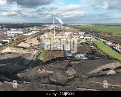 Landfill dumping ground, heaps of waste in compund facility in Alkmaar, The Netherlands. Containers for collection and segmentation. Aerial. Stock Photo