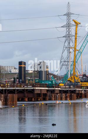 Harefield, Uxbridge, UK. 27th January, 2023. HS2 High Speed Rail construction work for the viaduct of sheet piling, installing cofferdams and jetty building have taken place across Harefield Lake No 2. Rotary piling for the ground and lake piers is now underway. The popular  Hillingdon Outdoor Activities Centre for sailing and boating on the lake has been permanently closed due to HS2. It has been widely reported in the press today that there is a possibility that HS2 could terminate in West London and not Euston due to costs, however, Chancellor Jeremy Hunt has denied this and said 'that he c Stock Photo