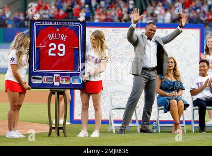 Retired player Adrian Beltre, left, and his wife Sandra, second