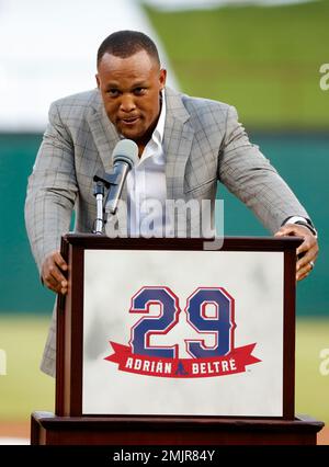 Former baseball player Adrian Beltre, left, greets former teammate Félix  Hernández after he was inducted into the Mariners Hall of Fame during a  ceremony before a baseball game between the Mariners and