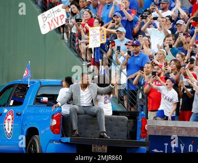 Former baseball player Adrian Beltre, left, greets former teammate Félix  Hernández after he was inducted into the Mariners Hall of Fame during a  ceremony before a baseball game between the Mariners and