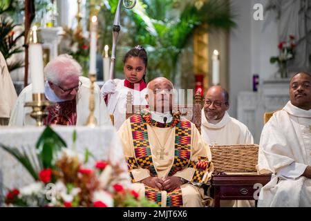 Archbishop designated by Pope Francis to the Archdiocese of Washington,  Archbishop Wilton D. Gregory, speaks during a news conference as Cardinal  Donald Wuerl looks on, at Washington Archdiocesan Pastoral Center in  Hyattsville