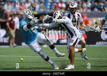 Cannons' Lyle Thompson (4) carries the ball past Redwoods' Patrick Harbeson  (40) during a Premier Lacrosse League game, Friday, June 4, 2021, in  Foxborough, Mass. The Redwoods won 12-11. (AP Photo/Steve Luciano Stock  Photo - Alamy