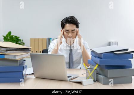 Business men in the office to work overtime Stock Photo