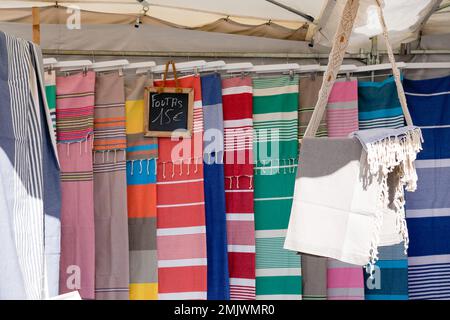 foutas beach towel for sale on colorful store fouta in outdoor market Stock Photo