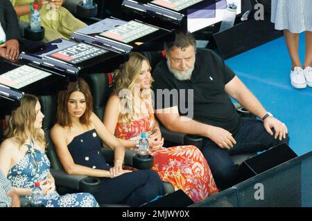 Melbourne, Australia. 28th Jan, 2023. Australian actor Russell Crowe (R) and Britney Theriot (L) watch the Women's Singles Final match between Elena Rybakina of Kazakhstan and Aryna Sabalenka on day 13 of the 2023 Australian Open at Melbourne Park in Melbourne, Australia. Sydney Low/Cal Sport Media/Alamy Live News Stock Photo