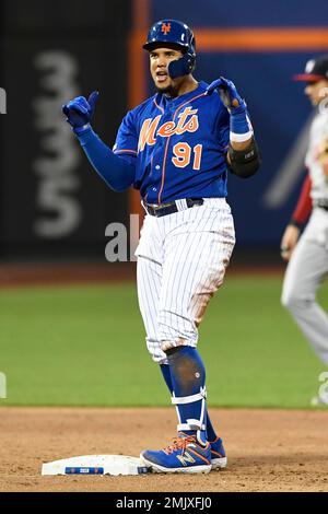 New York Mets center fielder Carlos Gomez (91) celebrates with