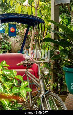 An abandonned tricycle on Ko Kret Island, Bangkok, Thailand Stock Photo