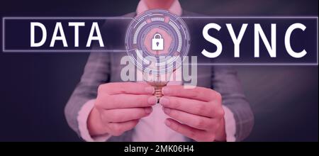 Conceptual caption Data Sync. Word Written on data that is continuously generated by different sources Stock Photo