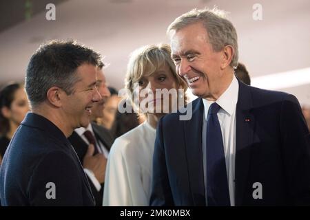 LVMH CEO Bernard Arnault and his wife Helene upon arrival to the