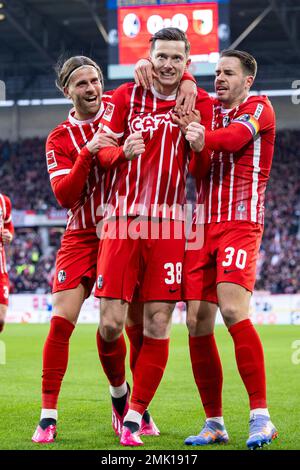 Freiburg Im Breisgau, Germany. 28th Jan, 2023. Soccer: Bundesliga, SC Freiburg - FC Augsburg, Matchday 18, Europa-Park Stadion. Freiburg's Michael Gregoritsch (M) celebrates with Freiburg's Lucas Höler (l) and Freiburg's Christian Günter (r) after his goal for 1:0. Credit: Tom Weller/dpa - IMPORTANT NOTE: In accordance with the requirements of the DFL Deutsche Fußball Liga and the DFB Deutscher Fußball-Bund, it is prohibited to use or have used photographs taken in the stadium and/or of the match in the form of sequence pictures and/or video-like photo series./dpa/Alamy Live News Stock Photo