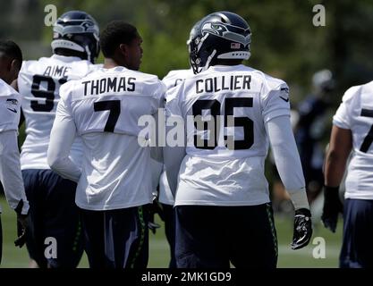 Seattle Seahawks defensive end L.J. Collier, (95), walks with his fiancé,  Samantha Lane, after the first day of NFL football rookie mini camp,  Friday, May 3, 2019, in Renton, Wash. (AP Photo/Ted