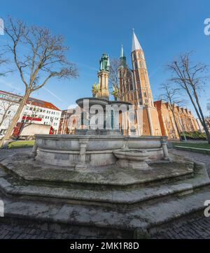 Henry the Lion Memorial Fountain (Heinrichsbrunnen) in front of St. Catherine Church - Braunschweig, Lower Saxony, Germany Stock Photo