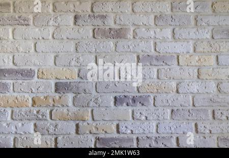 light wall made of different colorful bricks Stock Photo