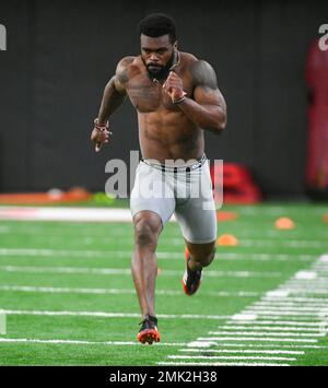 FILE - In this March 20, 2019, file photo, Georgia running back Elijah  Holyfield runs the 40-yard dash during Pro Day at the University of Georgia,  in Athens, Ga. Holyfield posted slow